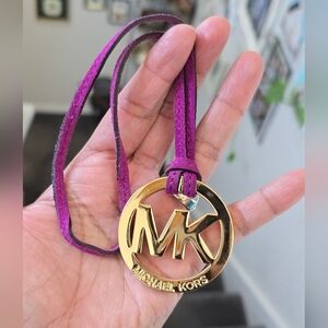 Michael Kors Gold and Purple Hang Tag